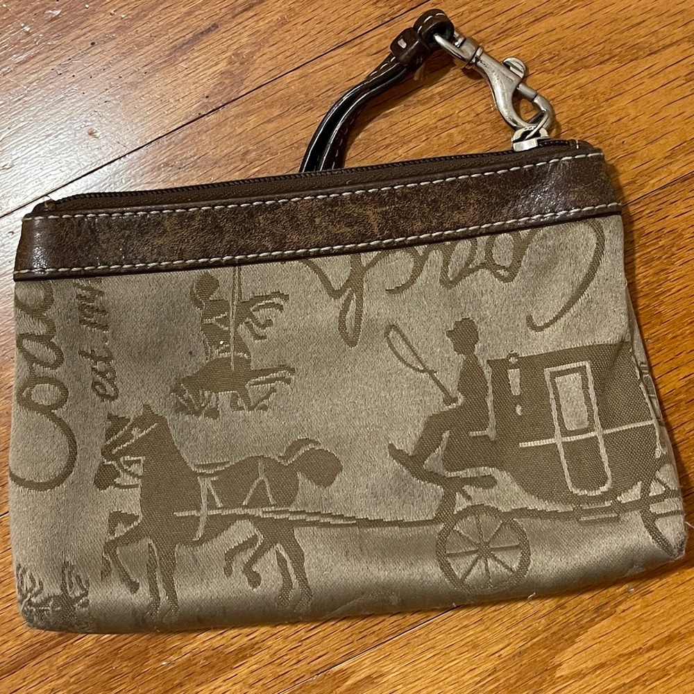Coach wristlet- Tan Canvas with Tan Leather Wrist Strap $50. Perfect condition.